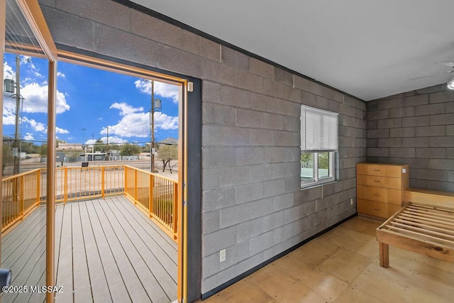 1125 N 13th Ave, Tucson, AZ 85705 - interior space featuring concrete block wall and a ceiling fan