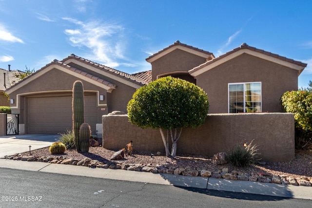 view of front of property with a garage