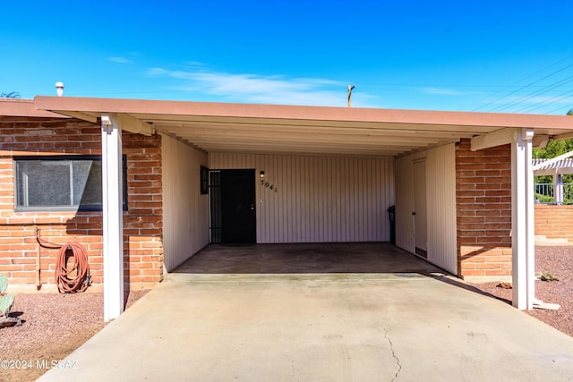 exterior space with a carport