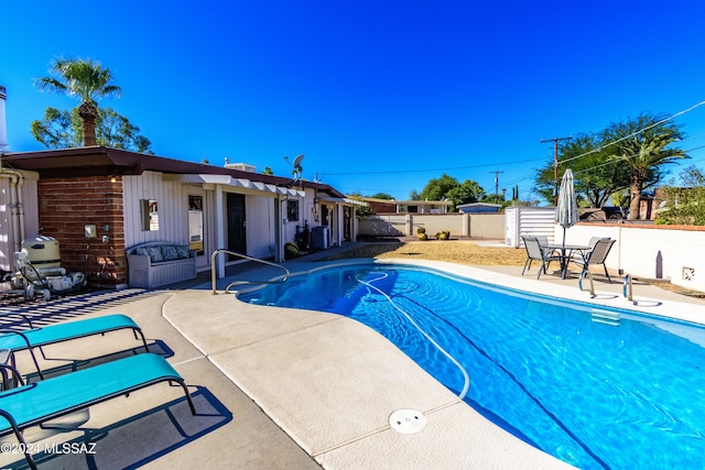 view of pool with a patio