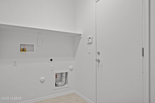 clothes washing area with hookup for a gas dryer, electric dryer hookup, and washer hookup