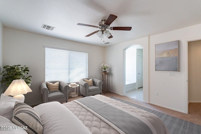 bedroom featuring ceiling fan and light colored carpet