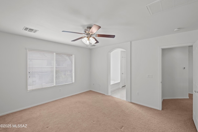 carpeted empty room with ceiling fan