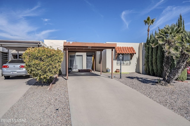 view of front of house featuring a carport