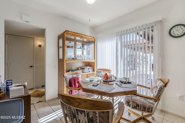 dining room with light tile patterned floors