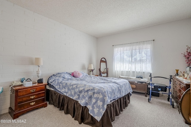 carpeted bedroom featuring a textured ceiling