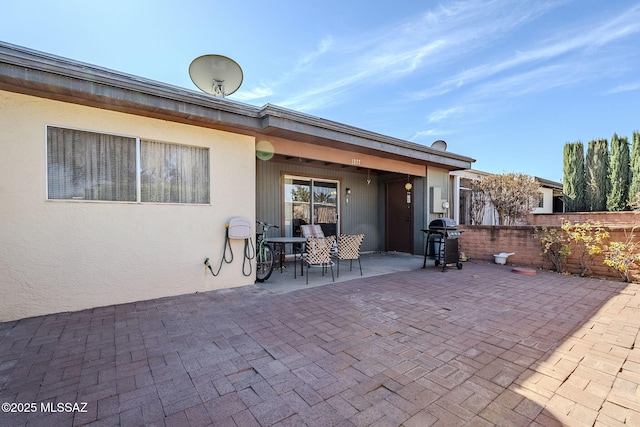 rear view of property with a patio area