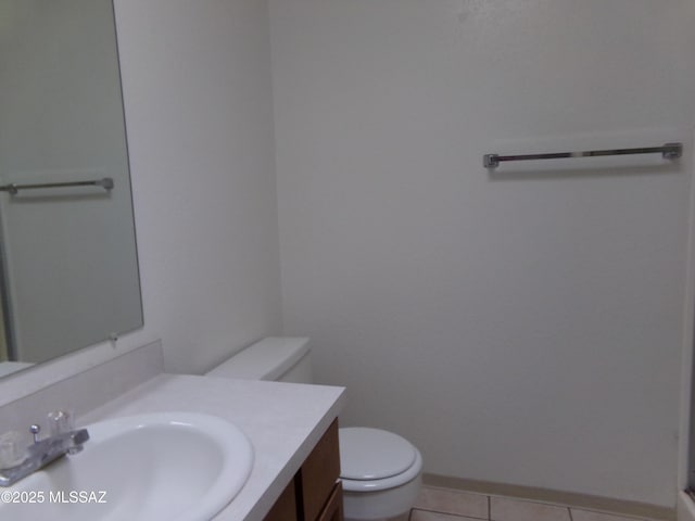 1377 S Desert Meadows Cir, Green Valley, AZ 85614 - half bath featuring toilet, tile patterned flooring, and vanity
