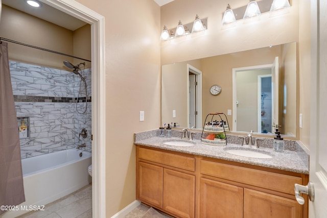 bathroom featuring shower / bathtub combination with curtain, vanity, and tile patterned flooring