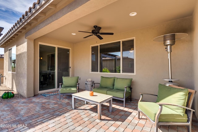 view of patio / terrace featuring an outdoor hangout area and ceiling fan