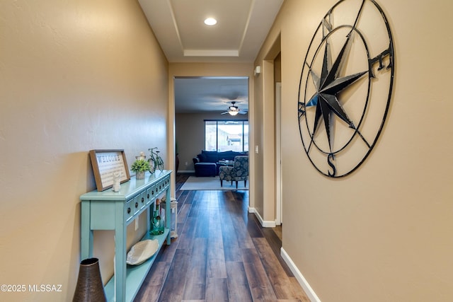 hall with dark hardwood / wood-style flooring