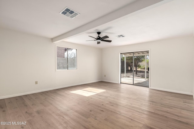 unfurnished room featuring beamed ceiling, ceiling fan, and light wood-type flooring