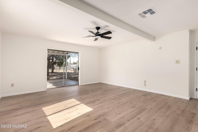 spare room featuring beamed ceiling, ceiling fan, and light wood-type flooring