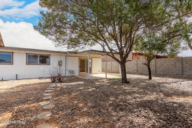 rear view of house featuring a patio area