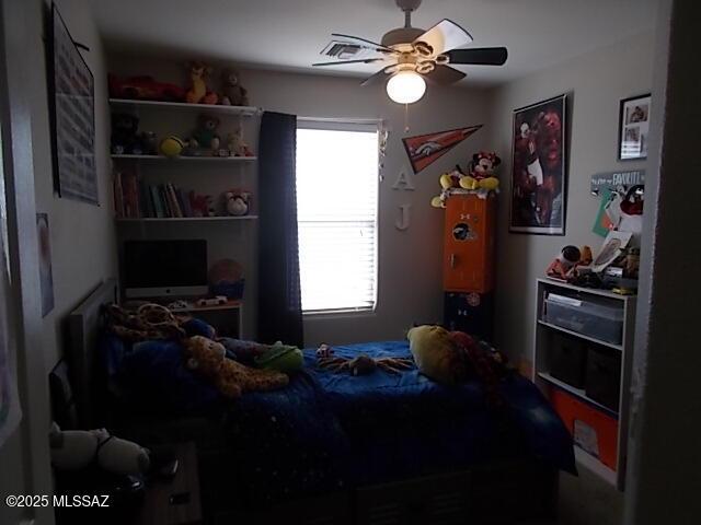 bedroom featuring ceiling fan