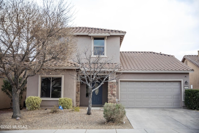 view of front of property featuring a garage