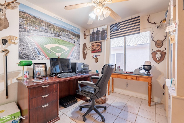 office featuring light tile patterned floors and a ceiling fan