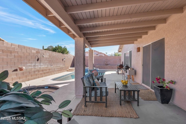 view of patio with a fenced in pool and a fenced backyard