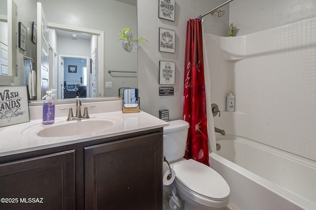 full bathroom featuring toilet, vanity, and shower / bath combo with shower curtain