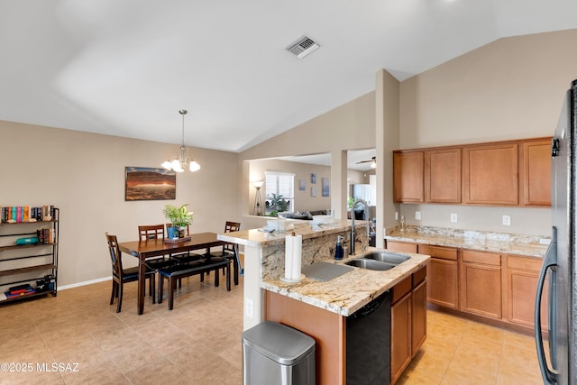 kitchen featuring a sink, visible vents, vaulted ceiling, hanging light fixtures, and black appliances