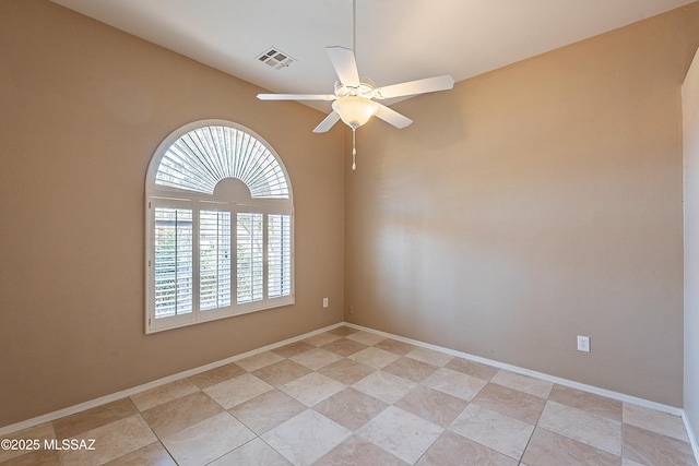 unfurnished room with ceiling fan