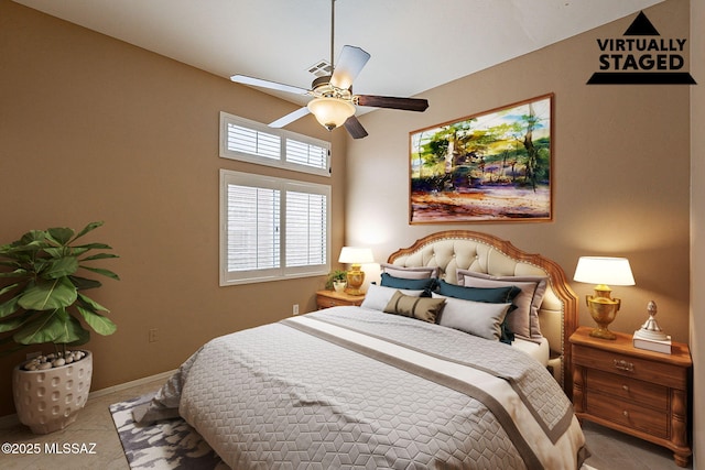 bedroom with light tile patterned flooring and ceiling fan