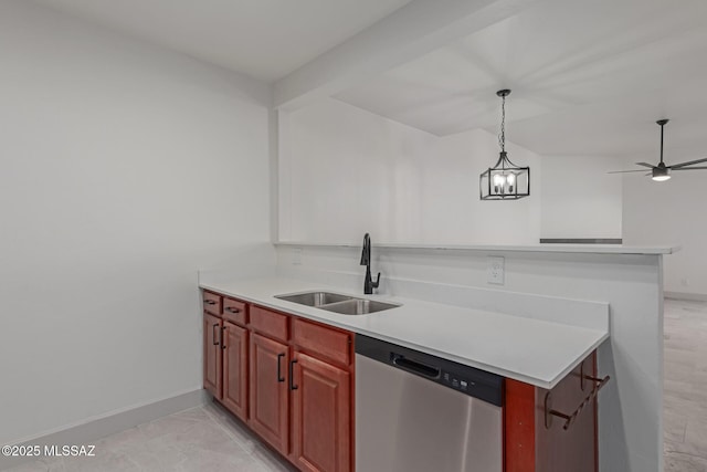 kitchen featuring sink, a breakfast bar area, decorative light fixtures, dishwasher, and kitchen peninsula