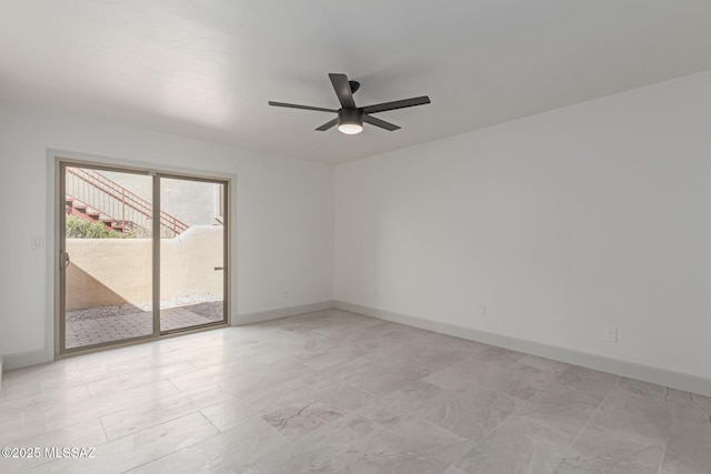 spare room featuring ceiling fan