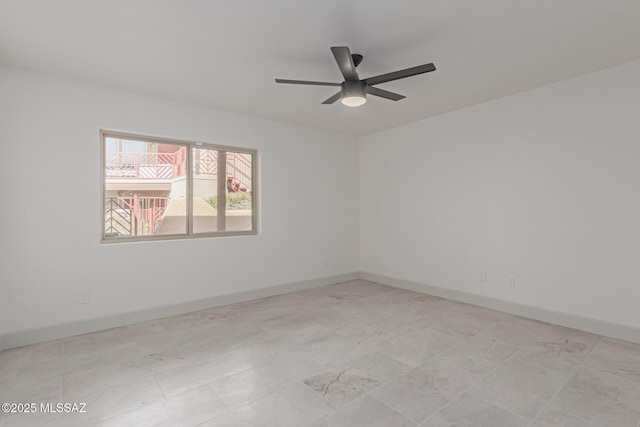 empty room featuring ceiling fan