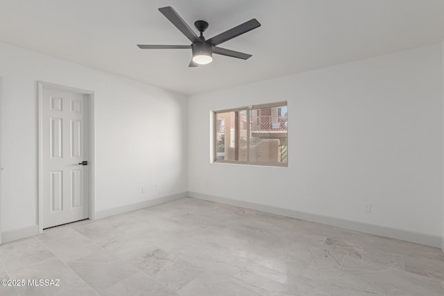 spare room featuring ceiling fan