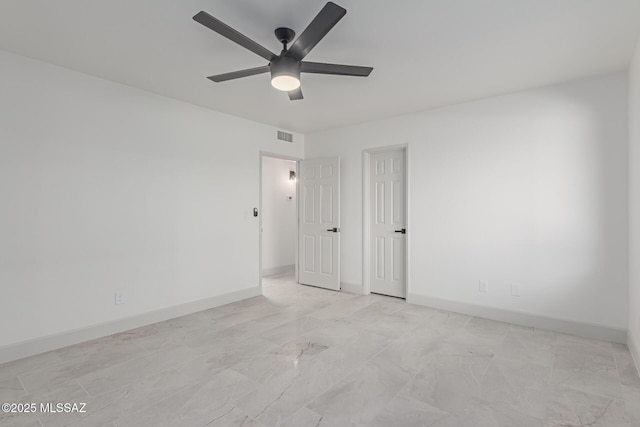 unfurnished room featuring ceiling fan