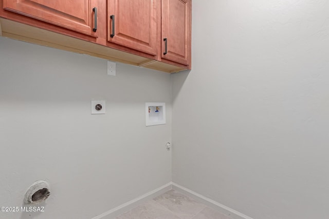 laundry room featuring cabinets, gas dryer hookup, hookup for an electric dryer, and washer hookup