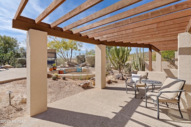 view of patio / terrace featuring a pergola