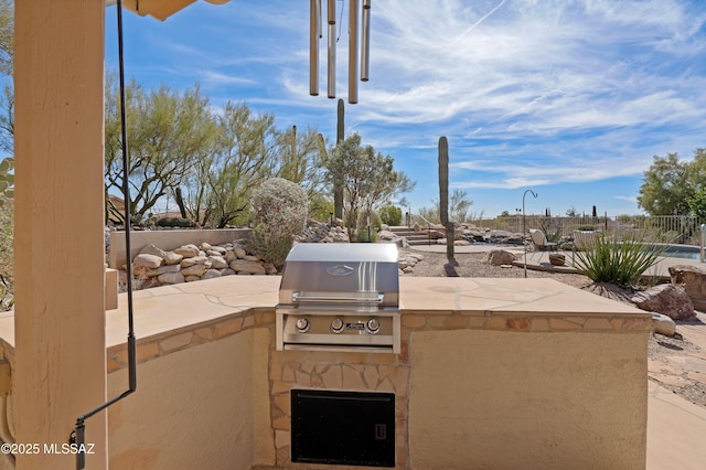 view of patio featuring area for grilling