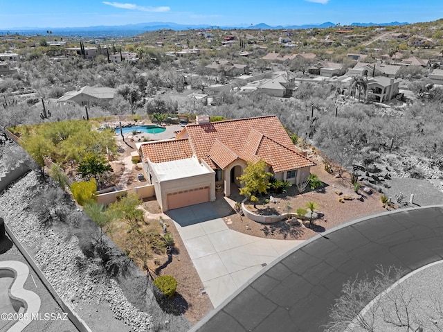 bird's eye view featuring a residential view and a mountain view