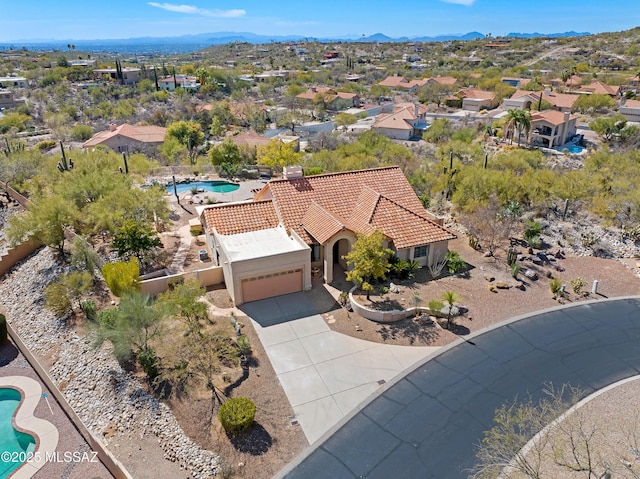 aerial view with a residential view and a mountain view