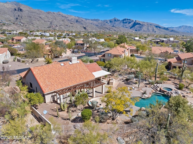 aerial view with a residential view and a mountain view