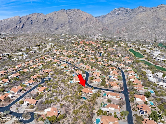 birds eye view of property with a residential view and a mountain view