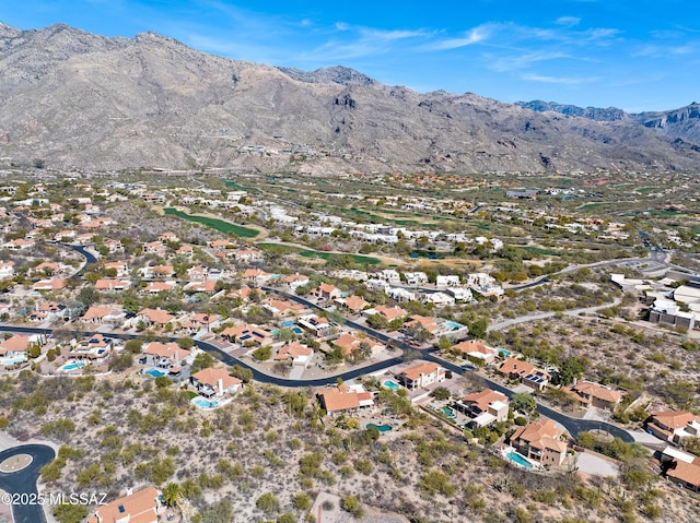 birds eye view of property with a residential view and a mountain view