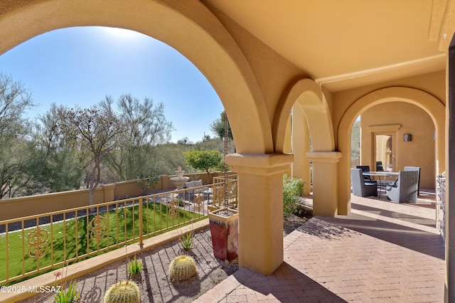 view of patio / terrace with a balcony