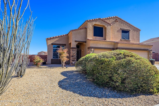 view of front of home with a garage