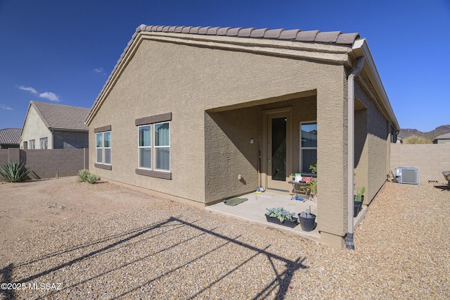 10139 N Sand Sage Trl, Marana, AZ 85653 - back of property with a patio and central AC unit