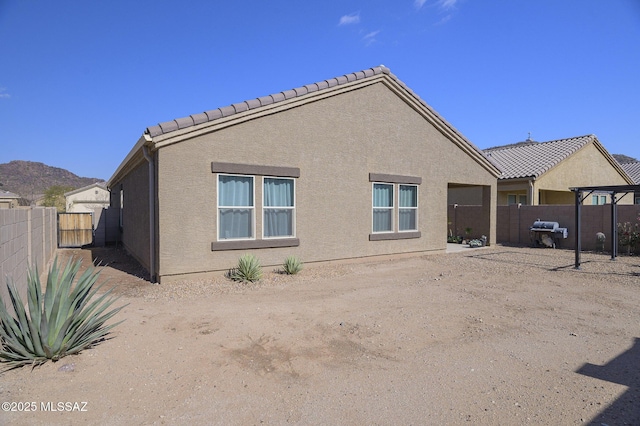10139 N Sand Sage Trl, Marana, AZ 85653 - rear view of house featuring a mountain view
