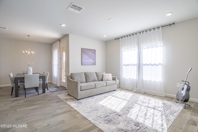 10139 N Sand Sage Trl, Marana, AZ 85653 - living room with a notable chandelier