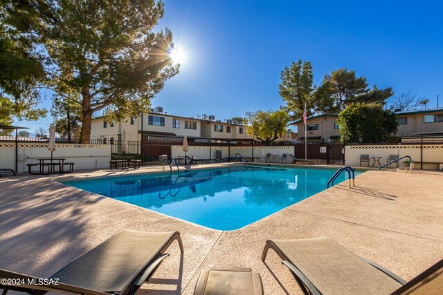 view of pool featuring a patio