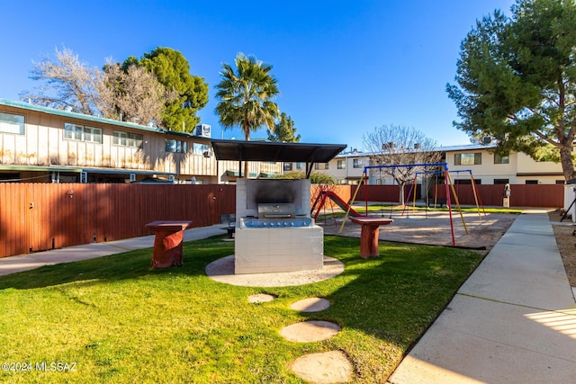 view of yard featuring a playground