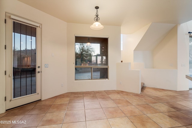 interior space featuring light tile patterned floors