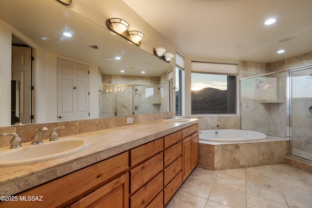 bathroom with vanity, tile patterned flooring, a wealth of natural light, and shower with separate bathtub