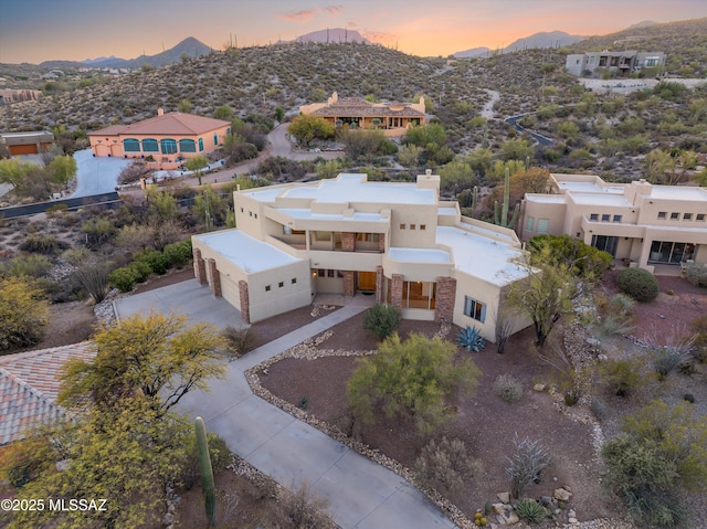 view of aerial view at dusk