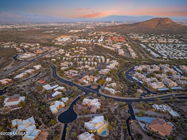 aerial view at dusk with a mountain view